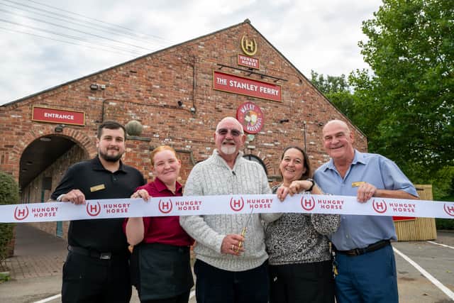 Stanley Ferry regular Malcolm Hepworth cut the ribbon.