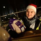 A staff member packs fresh turkeys ready for delivery at Sainsbury's Waltham Point Distribution Centre. Around 19,000 seasonal jobs are being created across one of the UK’s biggest retailers for Christmas (Photo: Matthew Lloyd/Getty Images)