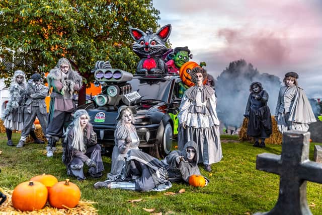The Alton Ancestors roam the park, adding some family fun to the night's festivities