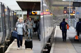 Stock images of a train at a UK station.