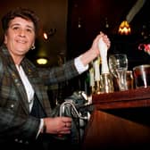 Barmaid Jackie Mudd at The Middleton Arms in February 1997  who could remember some 1,500 drinks requested by customers.
