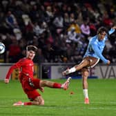 BLITZ: Leeds United youngster Charlie Crew and his Wales under-21s side were hammered 7-0 by Belgium's under-21s at Rodney Parade, above.