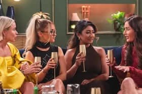 Married at First Sight UK series 10 brides Leah, Leigh, Nelly and Leisha during a dinner party. Photo by Channel 4.