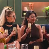 Married at First Sight UK series 10 brides Leah, Leigh, Nelly and Leisha during a dinner party. Photo by Channel 4.
