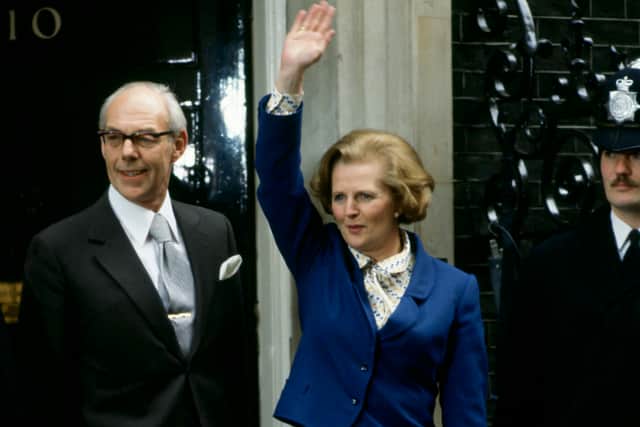 Margaret Thatcher enters 10 Downing Street in 1979.