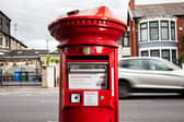 Royal Mail's new postbox of the future, which are being rolled out. They feature a solar panel, a barcode scanner and a drop down drawer to enable customers to send parcels. 