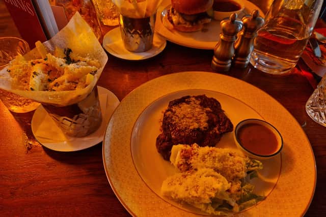 The 28-day dry-aged sirloin steak and Cosy Smash Burger were our mains.