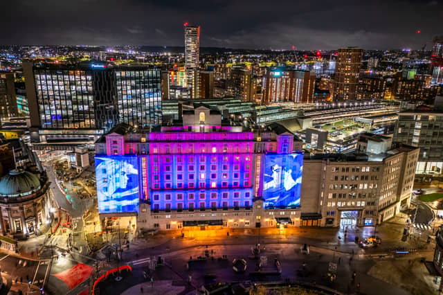 One Second Lovestory by Dirk Rauscher is projected on to the Queens Hotel.