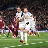 EARLY BREAKTHROUGH: The excellent Brenden Aaronson celebrates firing Leeds United ahead with Noah Okafor.