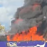 A bus on fire at the White Rose Shopping Centre in Leeds on Monday October 27.