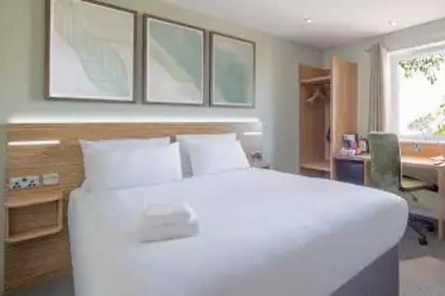 Travelodge rooms under the £35 deal include standard double en-suites like this one, with availability across the UK