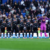 Leeds United players before kick-off at Brighton.