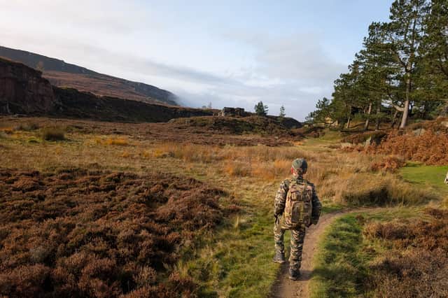 Dexter walking in Ilkley Moor in his army costume