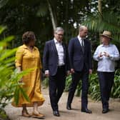 Keir Starmer and the Prince of Wales walk with museum staff during a visit to the Emilio Goeldi Museum in Belem, Brazil, ahead of the COP30 climate change summit 