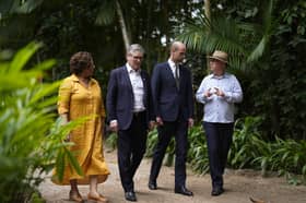 Keir Starmer and the Prince of Wales walk with museum staff during a visit to the Emilio Goeldi Museum in Belem, Brazil, ahead of the COP30 climate change summit 