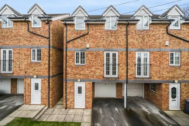 The attractive townhouse is close to amenities