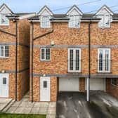 The attractive townhouse is close to amenities
