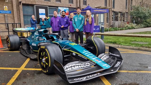 F1 driver Jak Crawford with Leeds Hospitals Charity members
