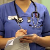 A nurse in the accident and emergency dept of Selly Oak Hospital in Birmingham. Around 18,000 staff roles are being cut in England as part of a major reorganisation (Photo: Christopher Furlong/Getty Images)