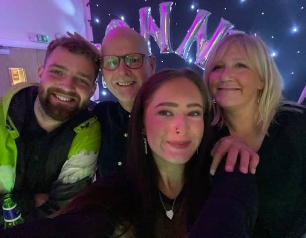 John Websdale with wife Paula and children Oliver and Megan