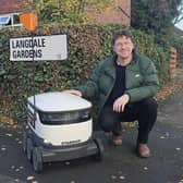 Councillor Jonathan Pryor pictured with one of the Starship robots ahead of the roll-out next month. 