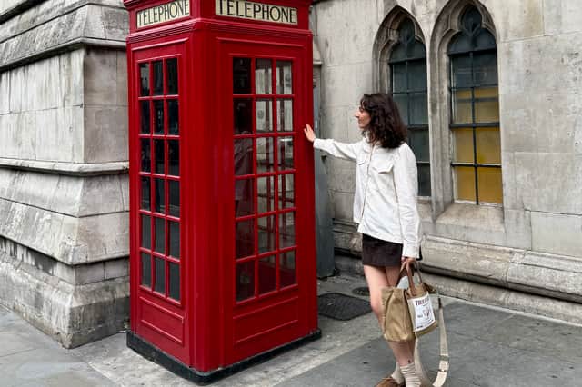 Kaitlin Wraight by a phone box