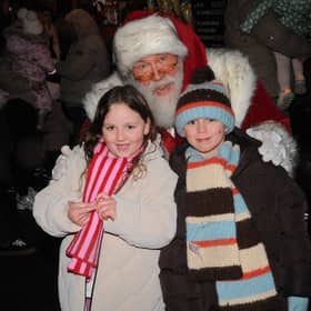 Santa meets Rose, six and Logan, eight, Townsend of Morley.
