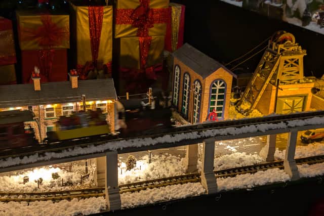 Every hotel lobby should have a festive miniature railway