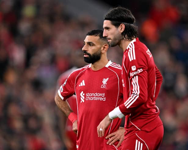 Mohamed Salah and Dominik Szoboszlai of Liverpool look on during the UEFA Champions League 2025/26 League Phase MD4 match between Liverpool FC and Real Madrid C.F. at Anfield on November 04, 2025 in Liverpool, England. (Photo by Liverpool FC/Liverpool FC via Getty Images)