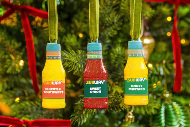 Subway are giving away sauce bottle shaped festive baubles inspired by its most popular sauces - Chipotle Southwest, Sweet Onion, and Honey Mustard.