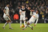 'ROLLS ROYCE': Leeds United captain Ethan Ampadu, right, against his former side in his battle against Chelsea and Enzo Fernandez, centre.