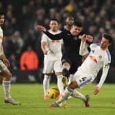 'ROLLS ROYCE': Leeds United captain Ethan Ampadu, right, against his former side in his battle against Chelsea and Enzo Fernandez, centre.