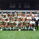Leeds United team group photograph showing the players and manager holding copies of the Yorkshire Evening Post as sponsors in 1991.