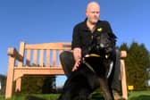 Dogs Trust Leeds Welfare Assistant Kevin Johnson is pictured with dog Opie.