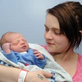 Mum Jodie Gill from Whinmoor with baby CJ Wright  born at 1.21am on New Year's Day at St James's Hospital weighing 6lb 11oz. 
