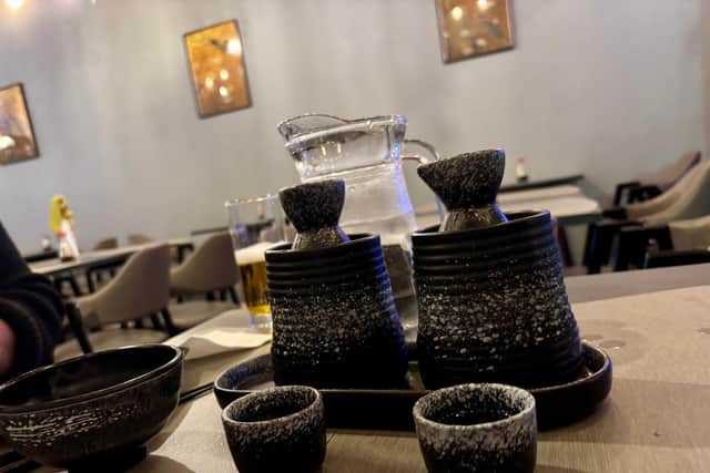 The sake is boozy and warming.