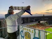 Chris Smith watched Leeds United face Brentford from his daughter's apartment. 