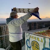 Chris Smith watched Leeds United face Brentford from his daughter's apartment. 
