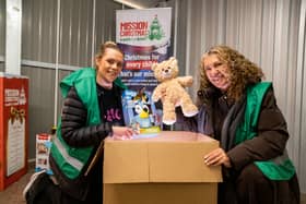 Volunteers Eileanoir McCormack, and Deborah Fletcher from Splendid Hospitality, sorted gifts following the massive donation to Mission Christmas by Persimmon Homes Foundation Trust.