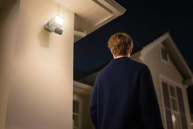 A motion sensor activates AI tracking, which follows people around