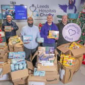 Mubs Mahmed (centre) with Kevin McKenna, Mick Forbes (right) and (rear) Clare from the charity and First Bus driver Chris Munden