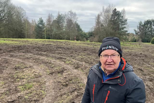 Councillor Barry Anderson at the scene of the damage to the park.