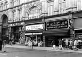 Kirkgate Market from Vicar Lane in May 1984. On the left is the Market Hall entrance, then Cut Price Records, no.13 Market Buildings, Economic Woollen Company, fabrics, no.14 and Joseph Hemsworth, jeweller, no.15.