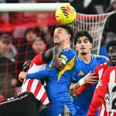 Sunderland's Lutsharel Geertruida (L) vies with Leeds United's Ethan Ampadu (C) during the Premier League match between Sunderland and Leeds United at The Stadium of Light. (Photo by ANDY BUCHANAN / AFP via Getty Images) 