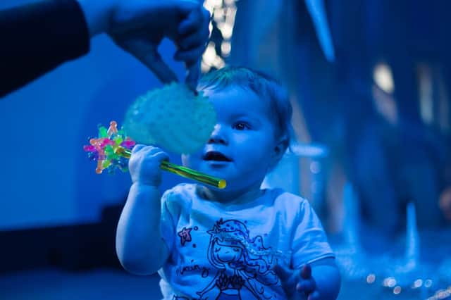 Baby enjoys creative play session
