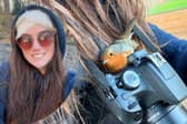Fay Wadsworth say she was 'blessed' by a robin at Yorkshire Wildlife Park, who sought warmth by landing in her hair. 