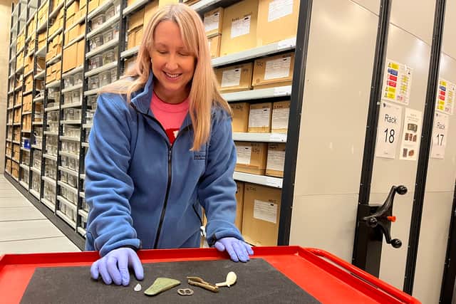 Kat Baxter, Leeds Museums and Galleries’ curator of archaeology, pictured with the finds.