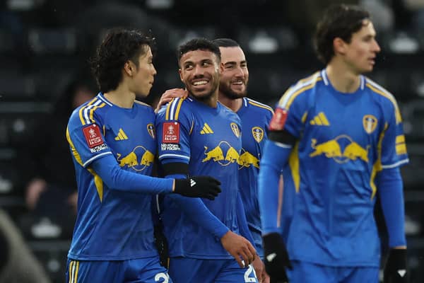 Leeds United players celebrate James Justin's first goal for the club.