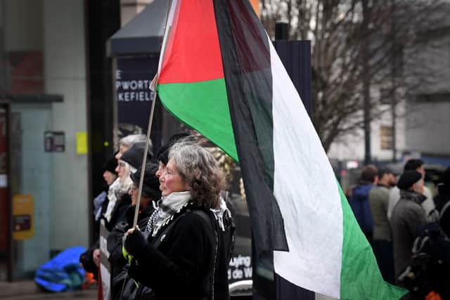 The group wear all black and stand in silence to call for an end to the conflict between Israel and Palestine