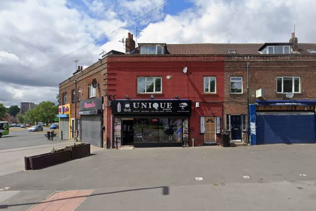 A wanted man climbed onto the roof of the building at the junction between Oakwood Lane and Oak Tree Drive.